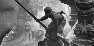 Ukrainian Alexei Berest hoists Victory Banner over Reichstag on May 01, 1945