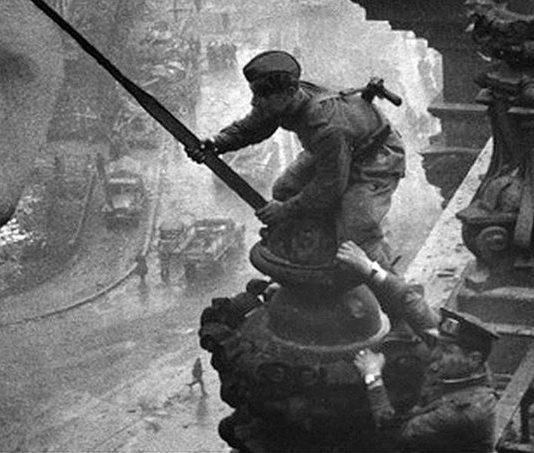 Ukrainian Alexei Berest hoists Victory Banner over Reichstag on May 01, 1945